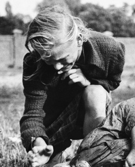 Detail of Julien Bryan's "Ten-year-old Polish girl Kazimiera Mika mourning the death of her sister, caused by strafing German aircraft, near Warsaw, Poland. 13 Sep 1939"